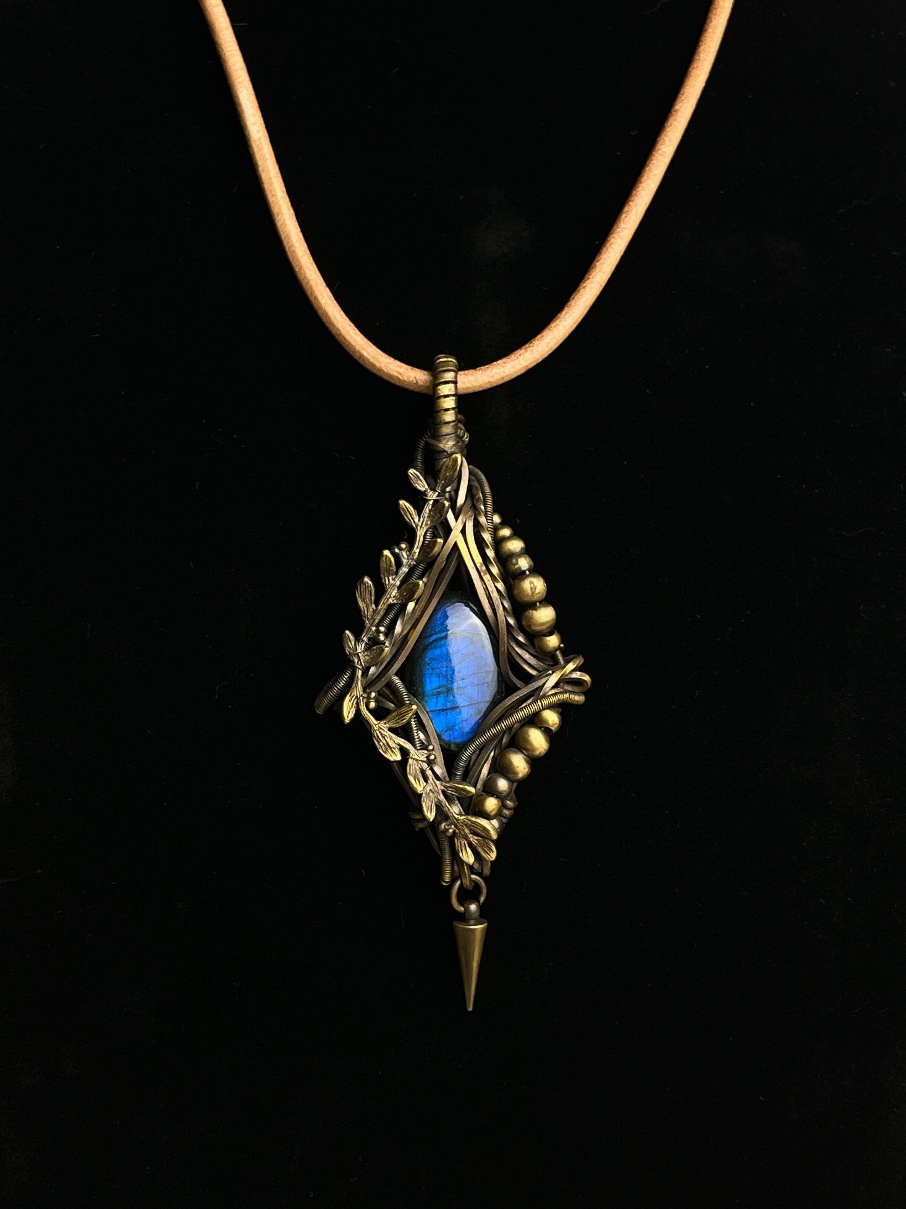 Blue-flash labradorite pendant with antiqued brass branch and leaf wirework
