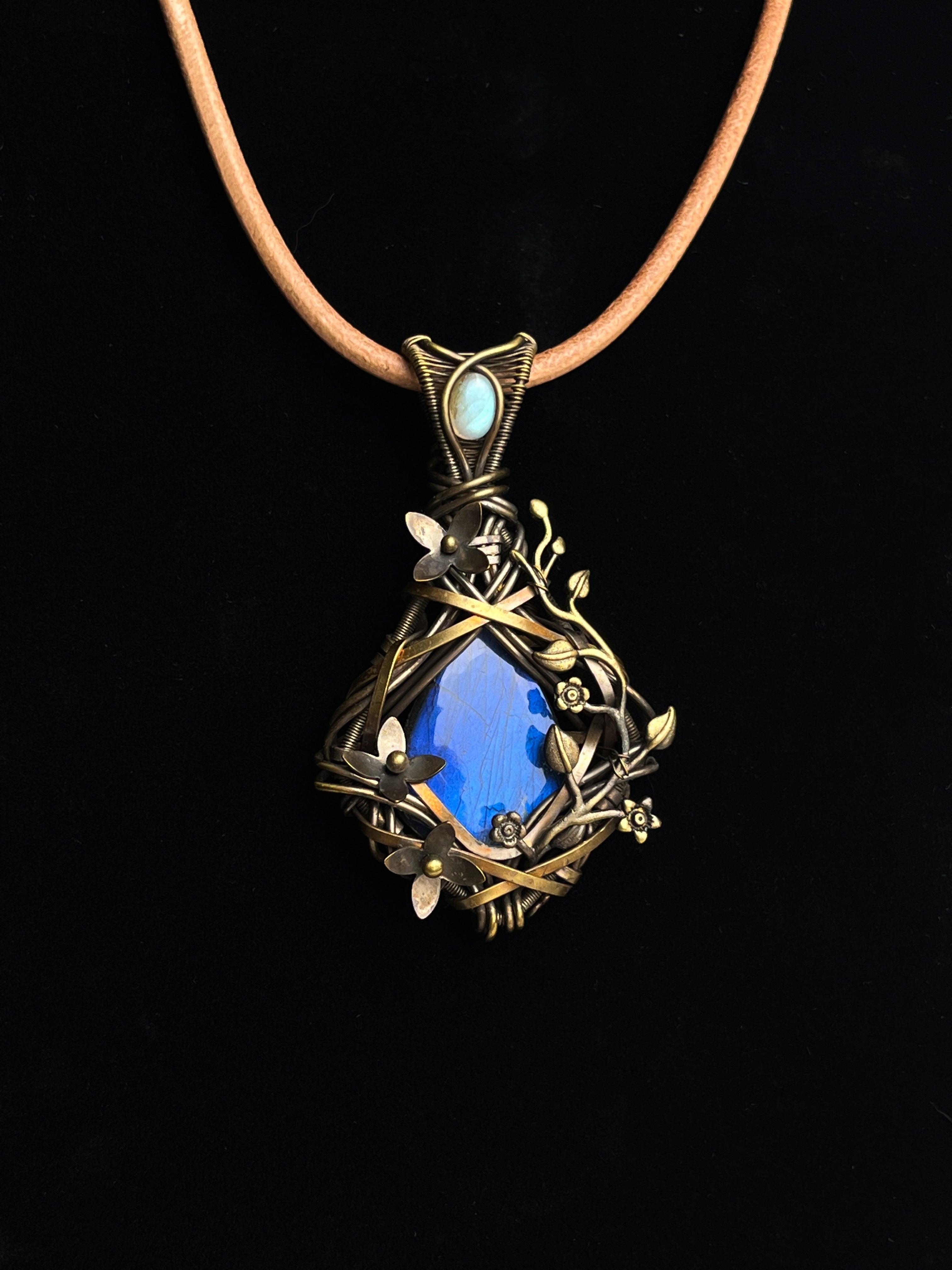 Blue-flash labradorite pendant with antiqued brass floral vine wirework