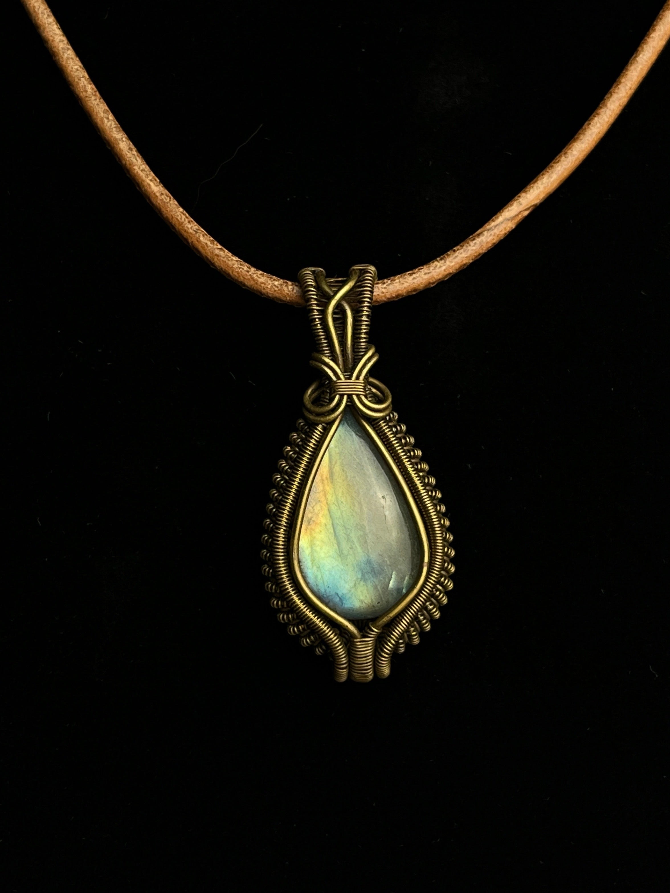 Teardrop labradorite pendant wrapped in antiqued brass wire