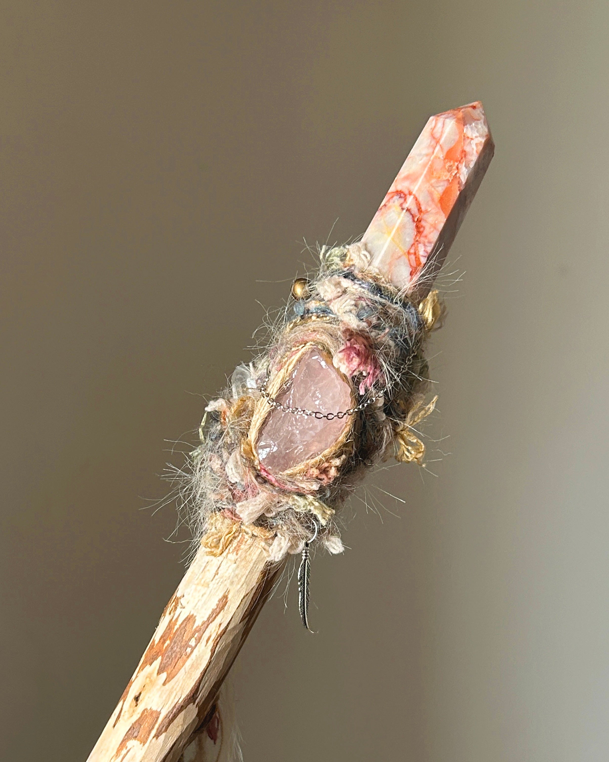Front view of heart healing wand with rhodochrosite point and rose quartz inset