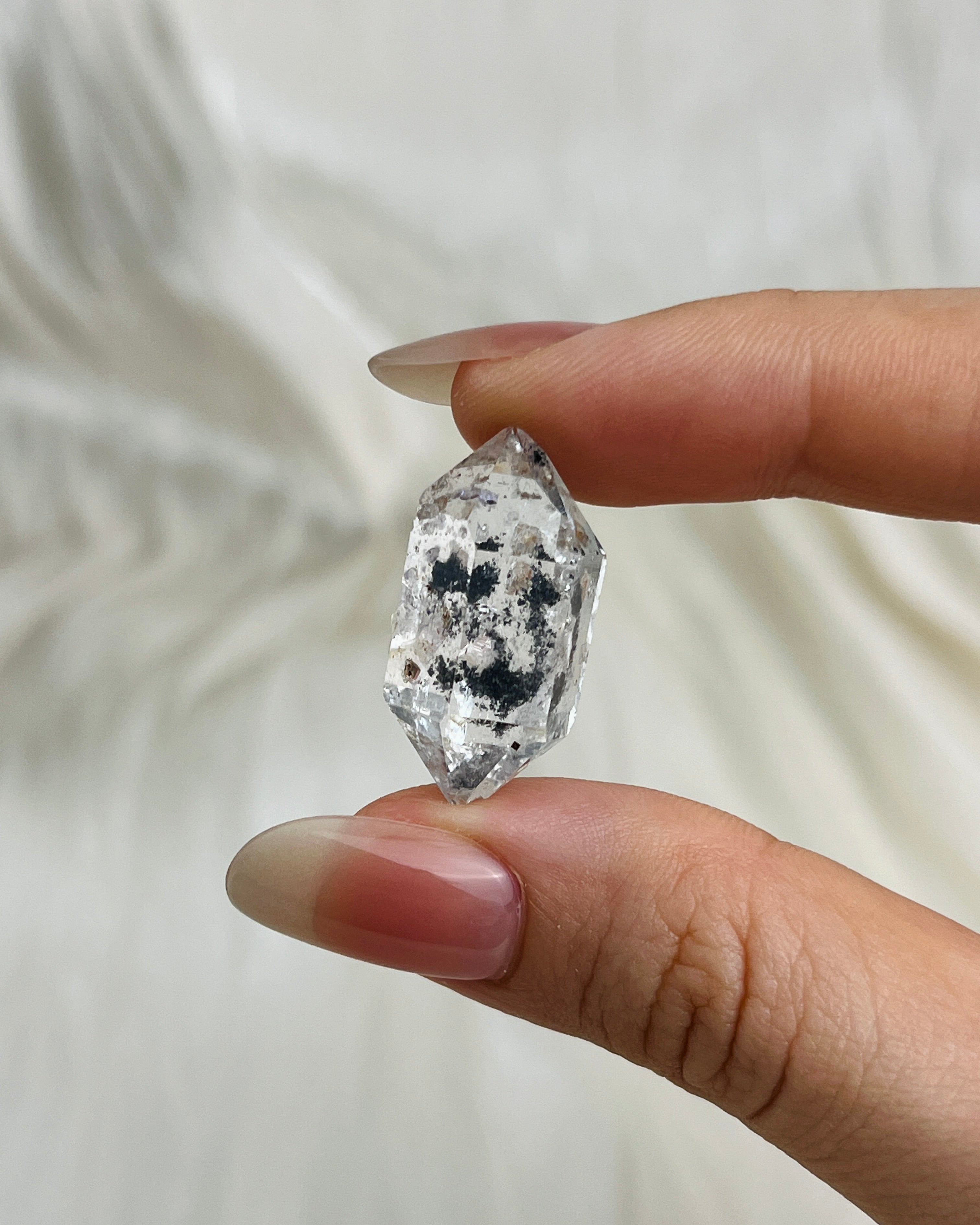 Transparent Chongqing Diamond Quartz with inky phantom inclusion aligned to outer edges and small rider crystal from China3