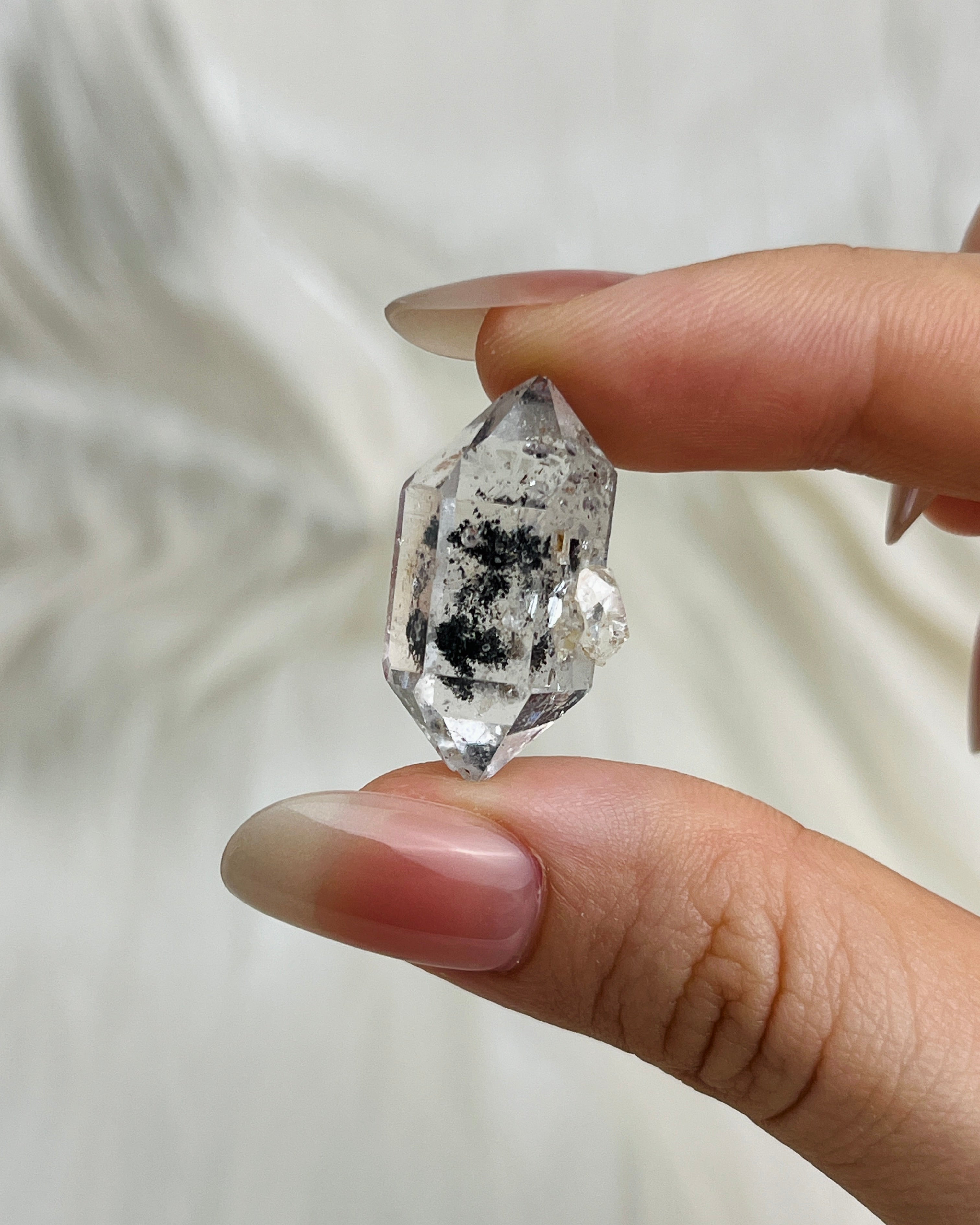 Transparent Chongqing Diamond Quartz with inky phantom inclusion aligned to outer edges and small rider crystal from China5