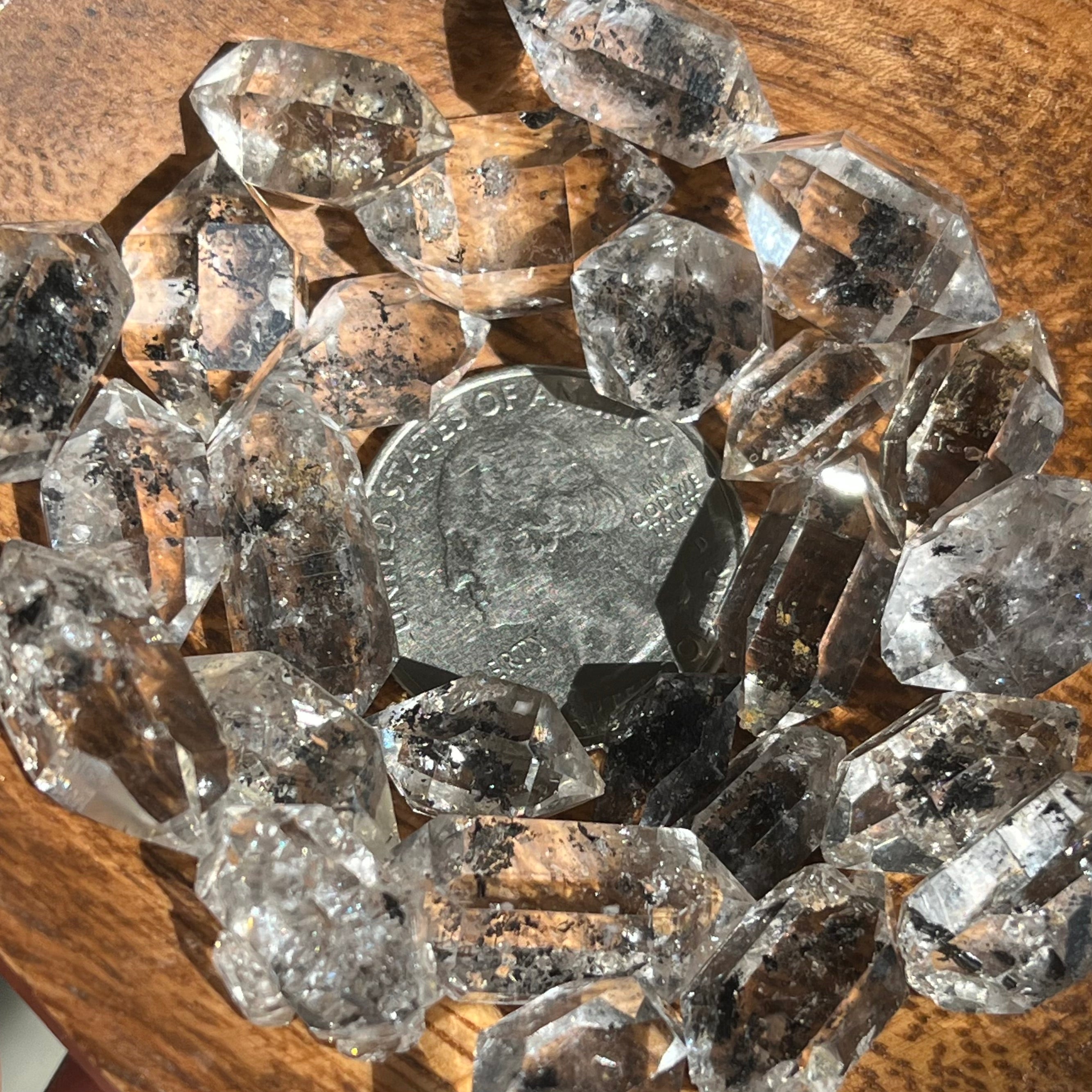 A–AA grade transparent Elestial Quartz crystals with hydrocarbon inclusions.
