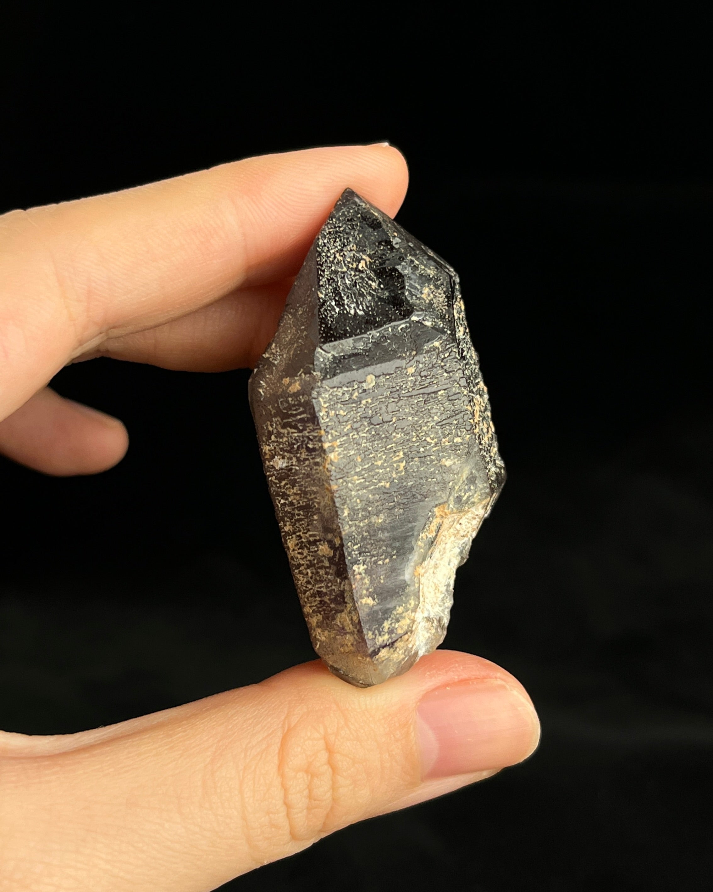 Namibian amethyst with violet core and etched crocodile-textured surface, showing dark micro-inclusions.2