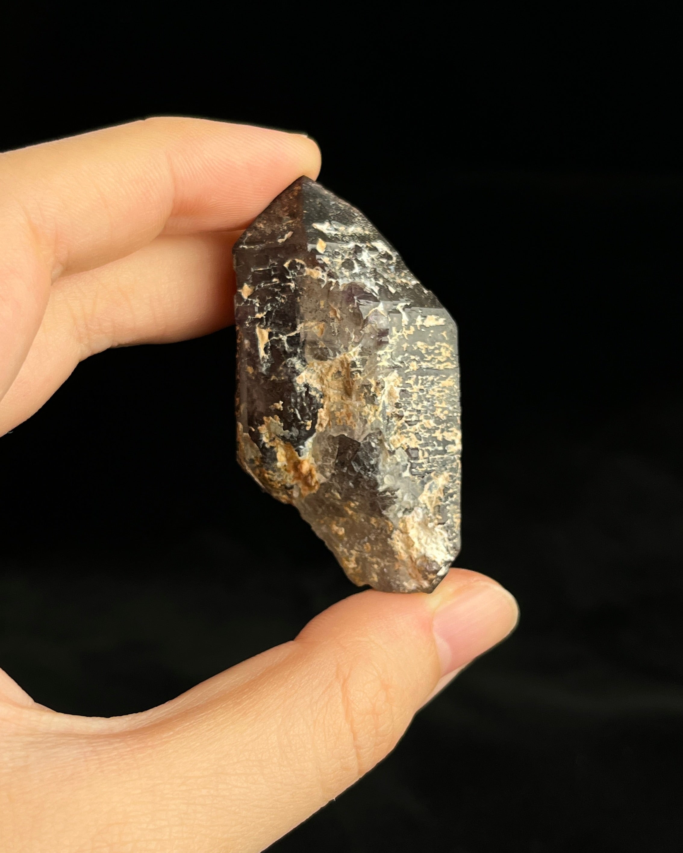 Namibian amethyst with violet core and etched crocodile-textured surface, showing dark micro-inclusions.5