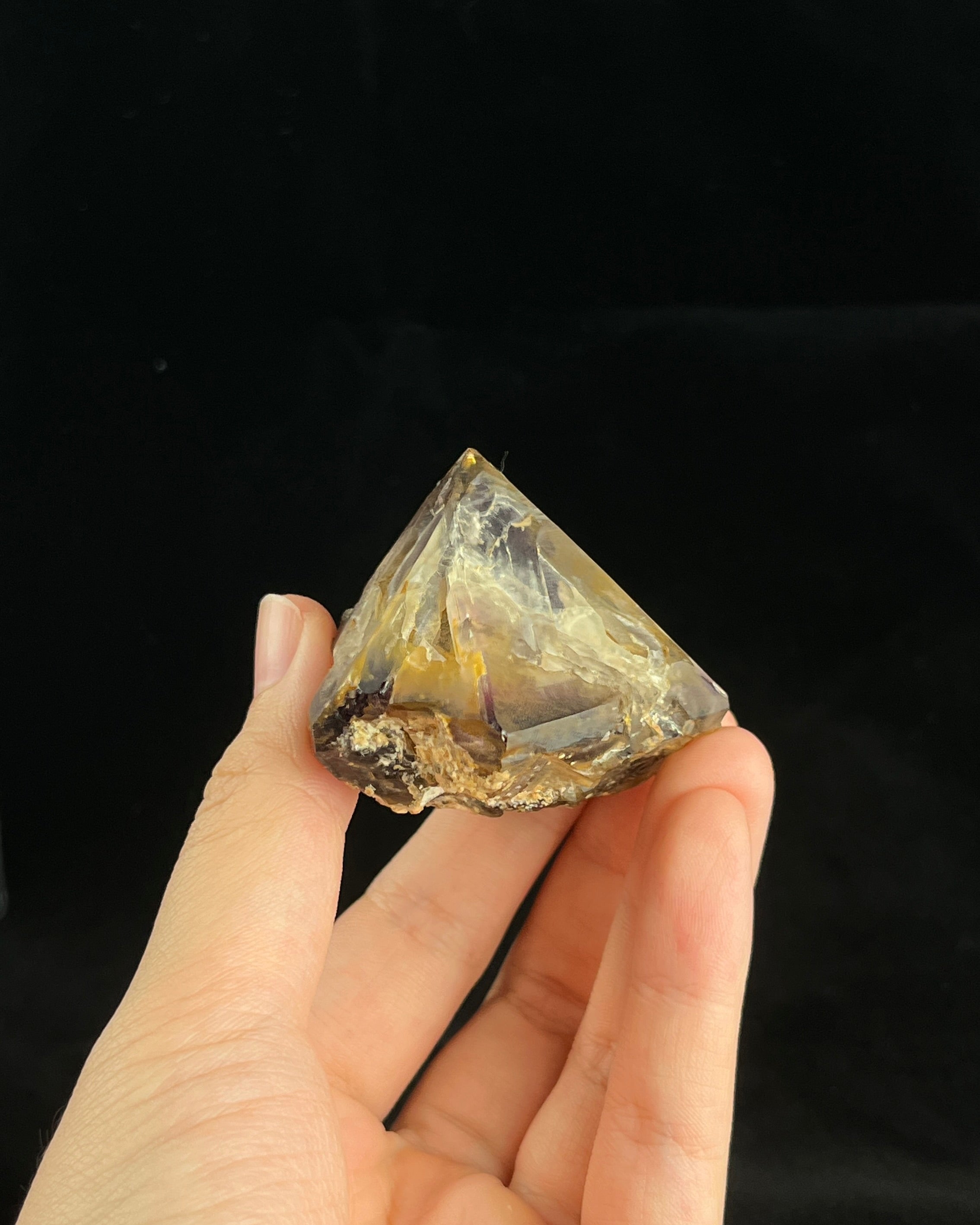 Natural Namibian skeletal amethyst specimen with etched “mountain” formations and smoky-violet zoning.5
