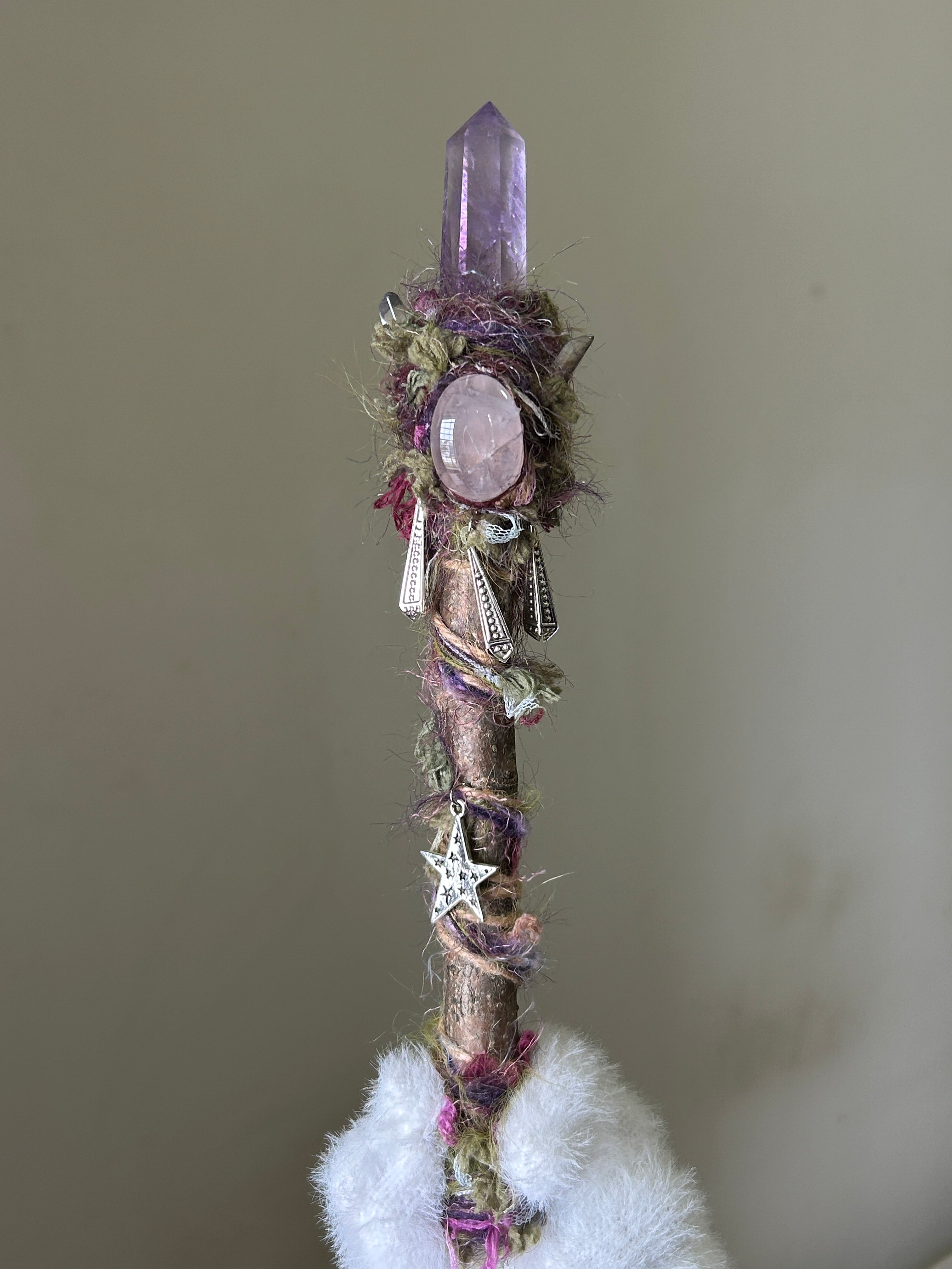 Front view of willow wand with amethyst point and rose quartz accent