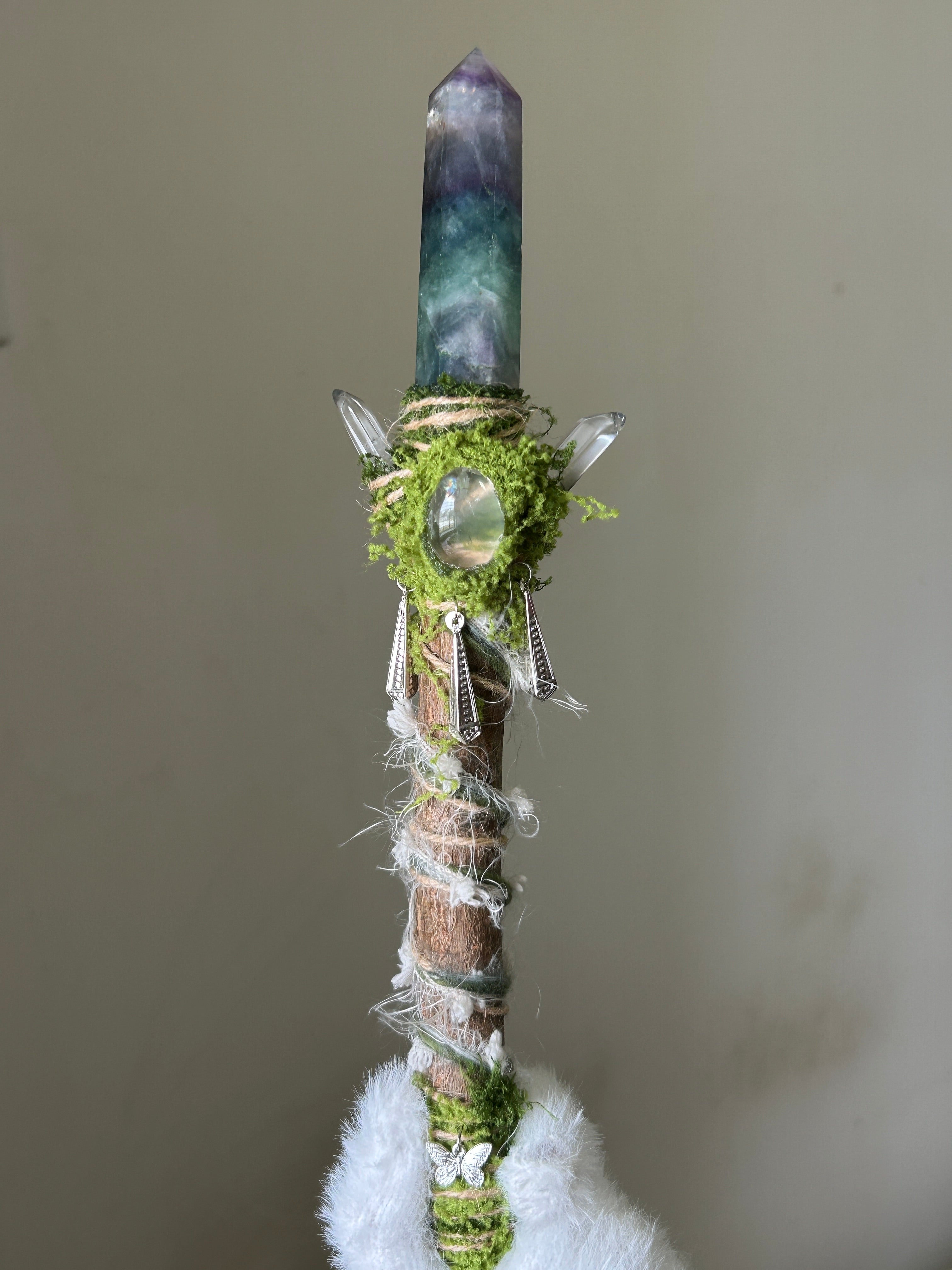 Front view of willow wand with green fluorite and quartz accents