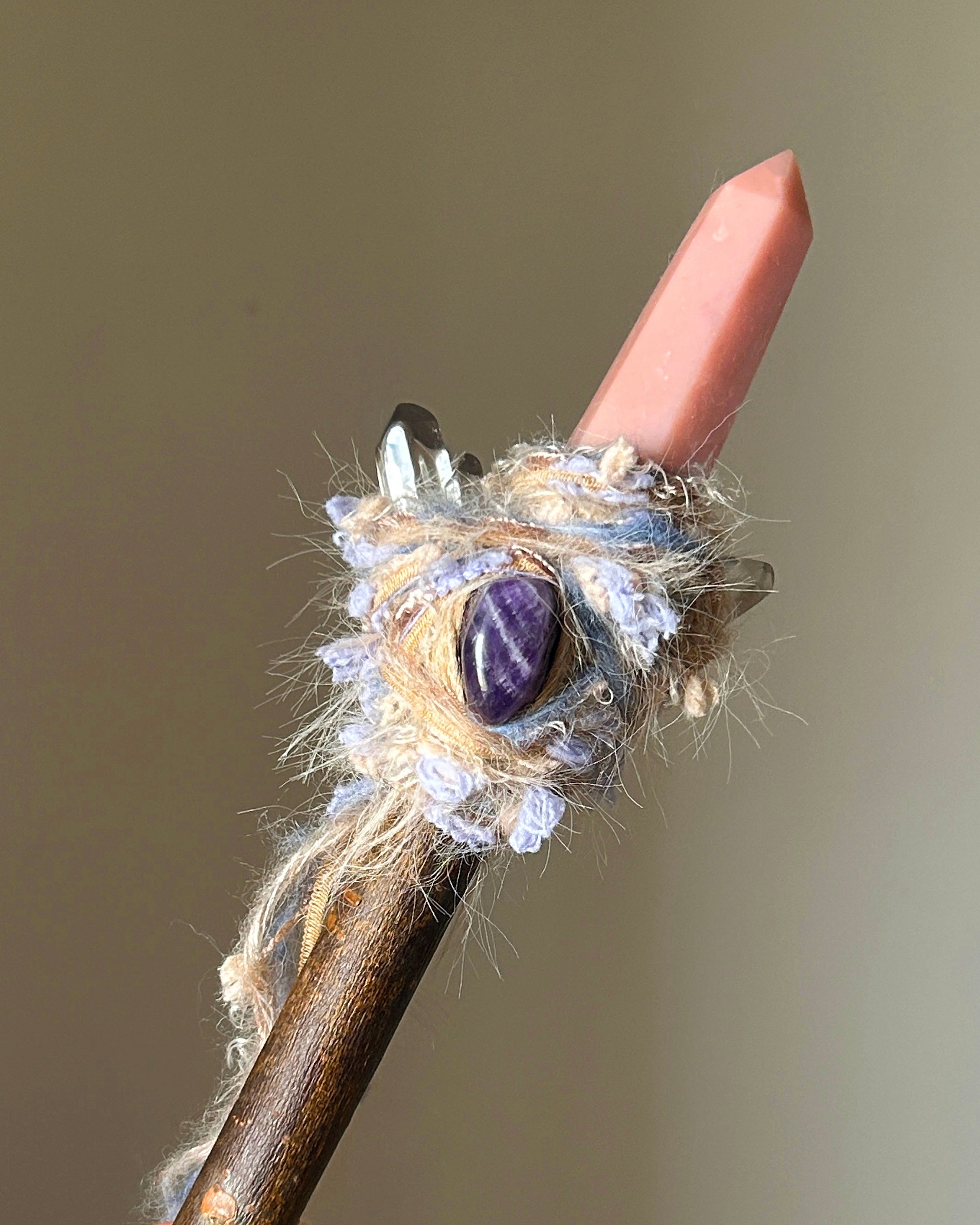 Front view of willow wand with pink opal point and amethyst cabochon