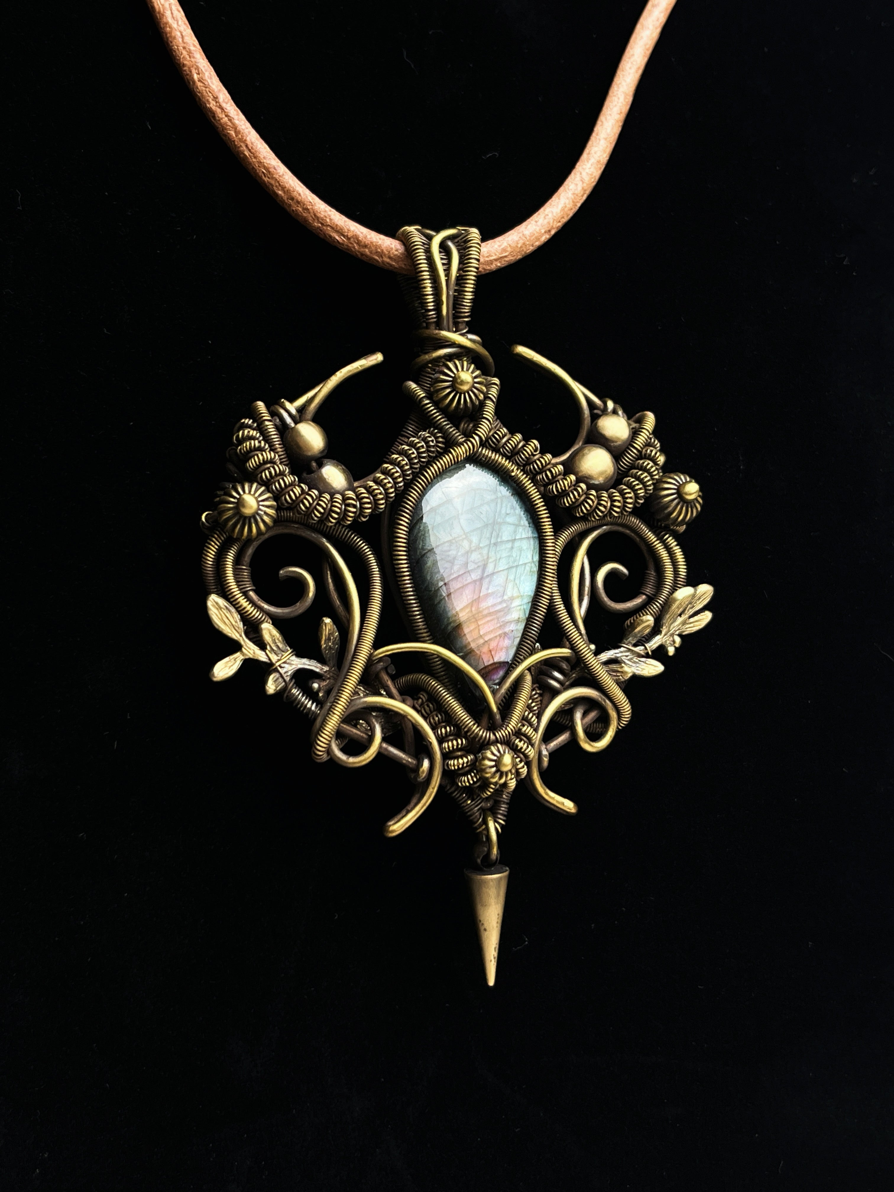 Hand-wrapped labradorite pendant with antiqued brass floral wirework1