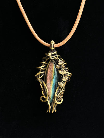 Labradorite pendant with antiqued brass ginkgo leaf and vine wirework