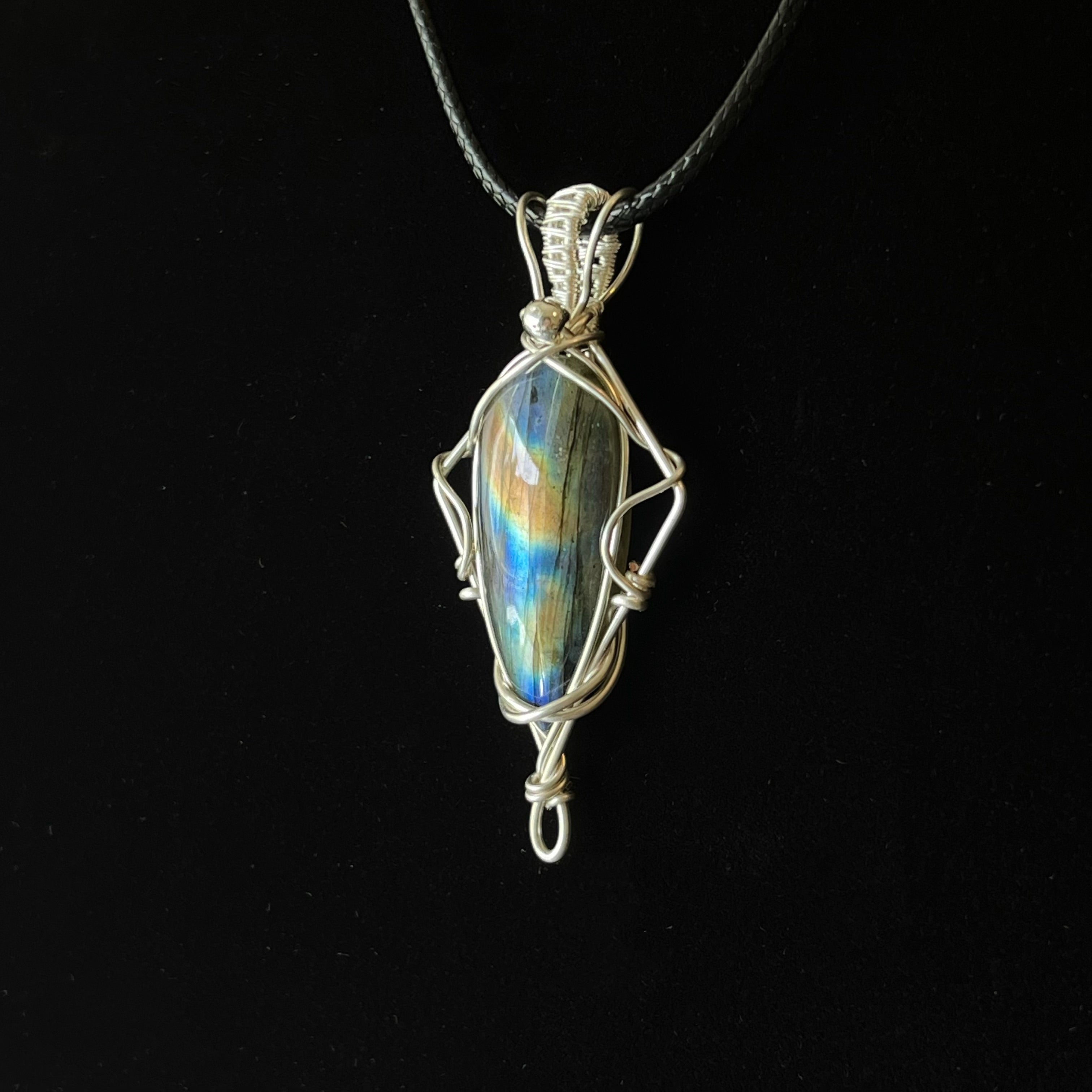 Silver wire-wrapped Earthrise Labradorite pendant with vertical blue-gold flash