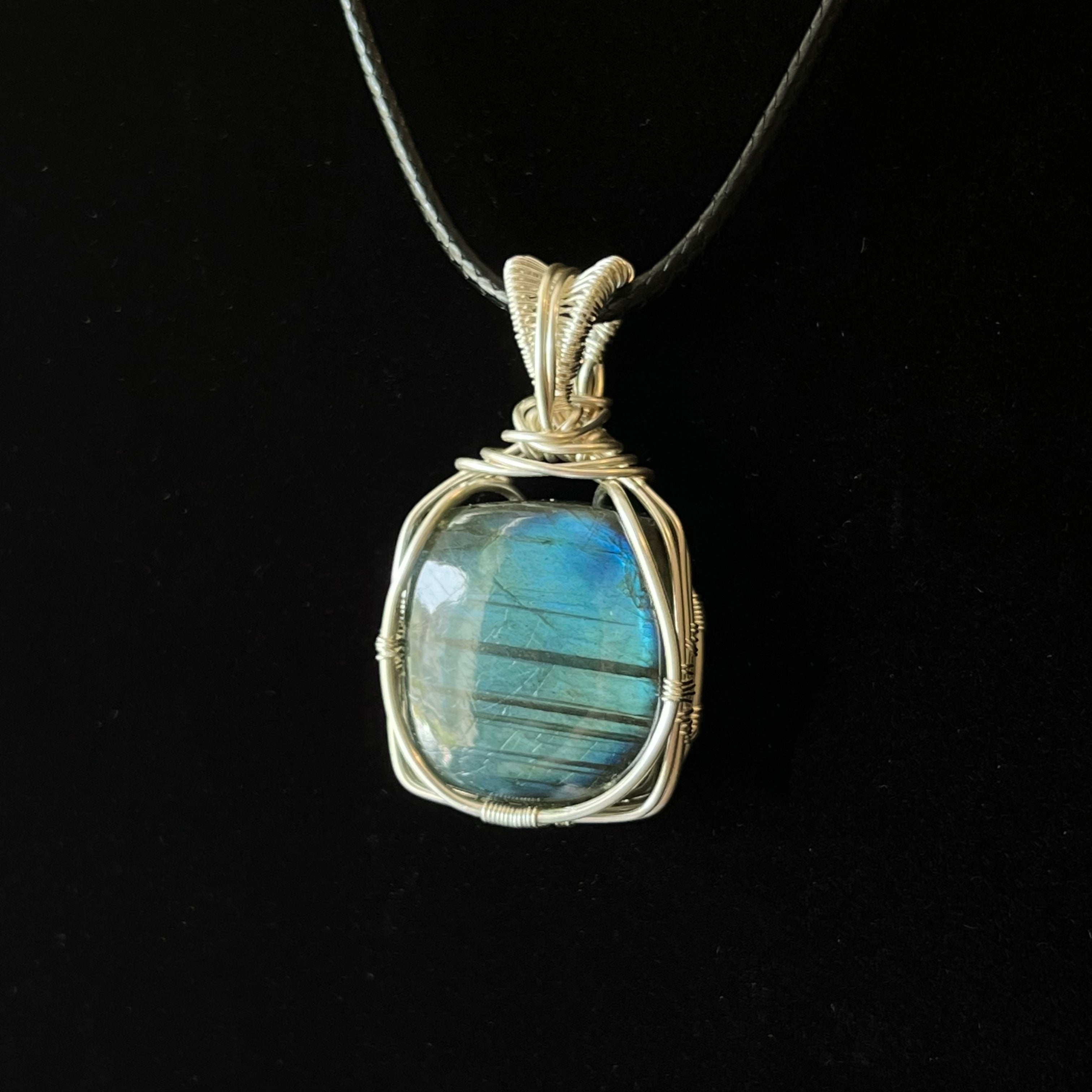Silver wire-wrapped square labradorite pendant with blue-green horizontal flash