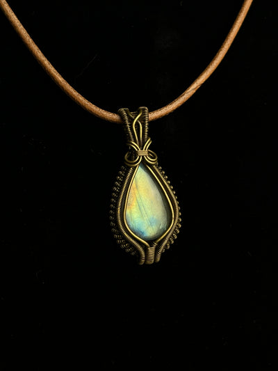 Teardrop labradorite pendant wrapped in antiqued brass wire1