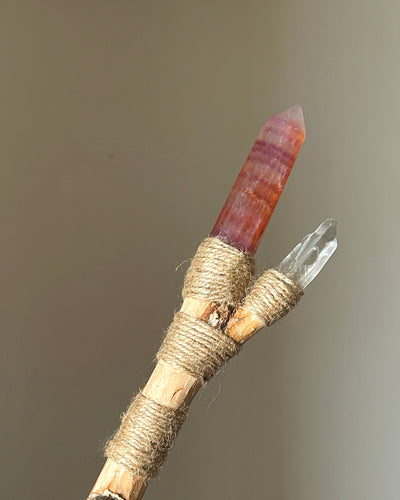 Back view of fire element wand with branching quartz and jute wrap