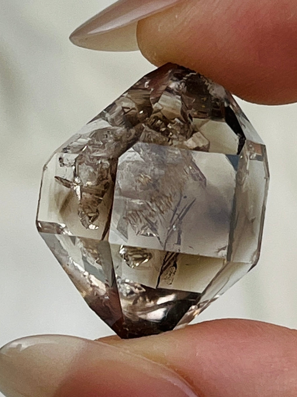 Champagne-colored Chongqing Diamond Quartz with two Isis faces and skeletal surface texture from China