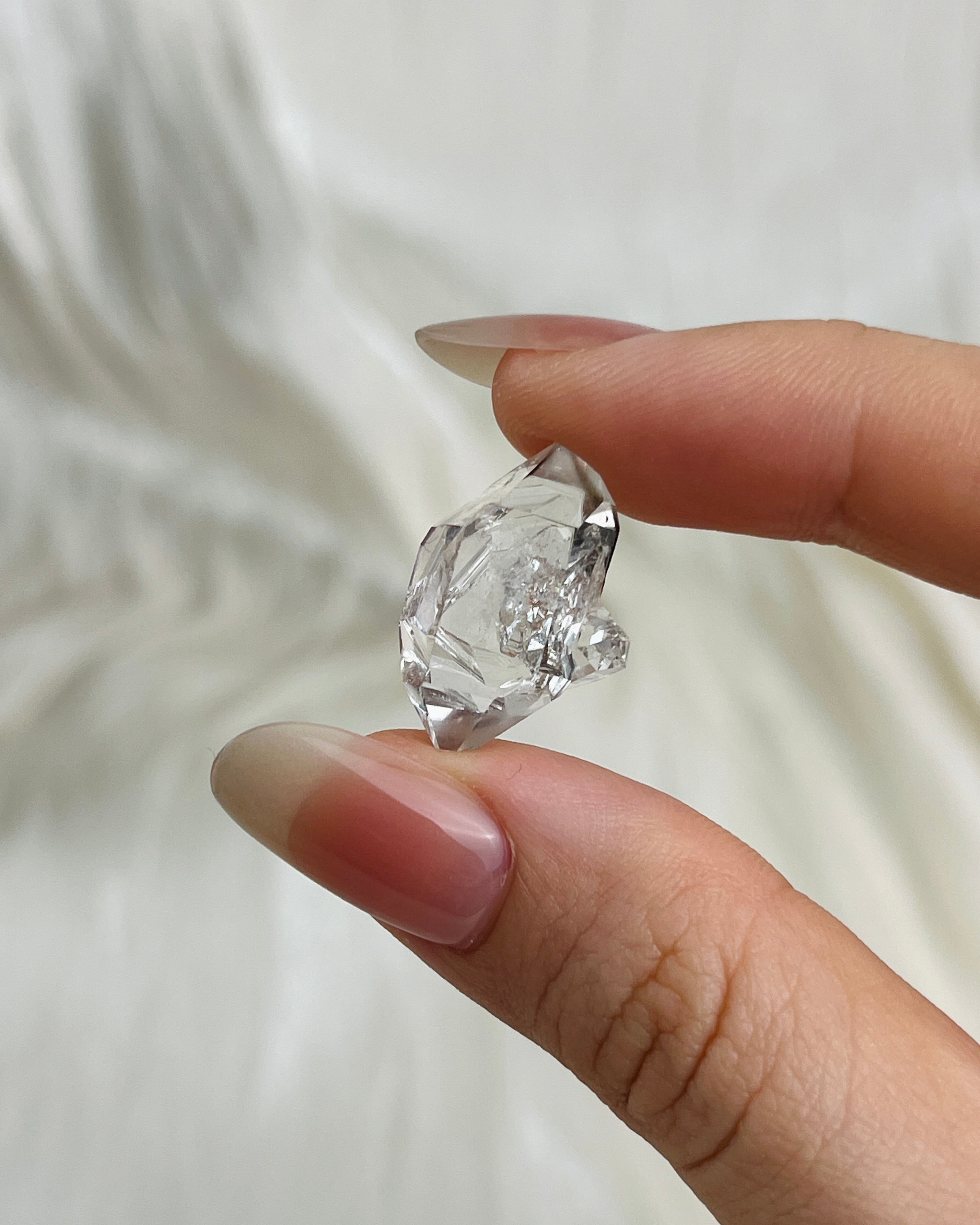 Bright Chongqing Diamond Quartz crystal with a flower-shaped surface mark and a light grey tip from China2