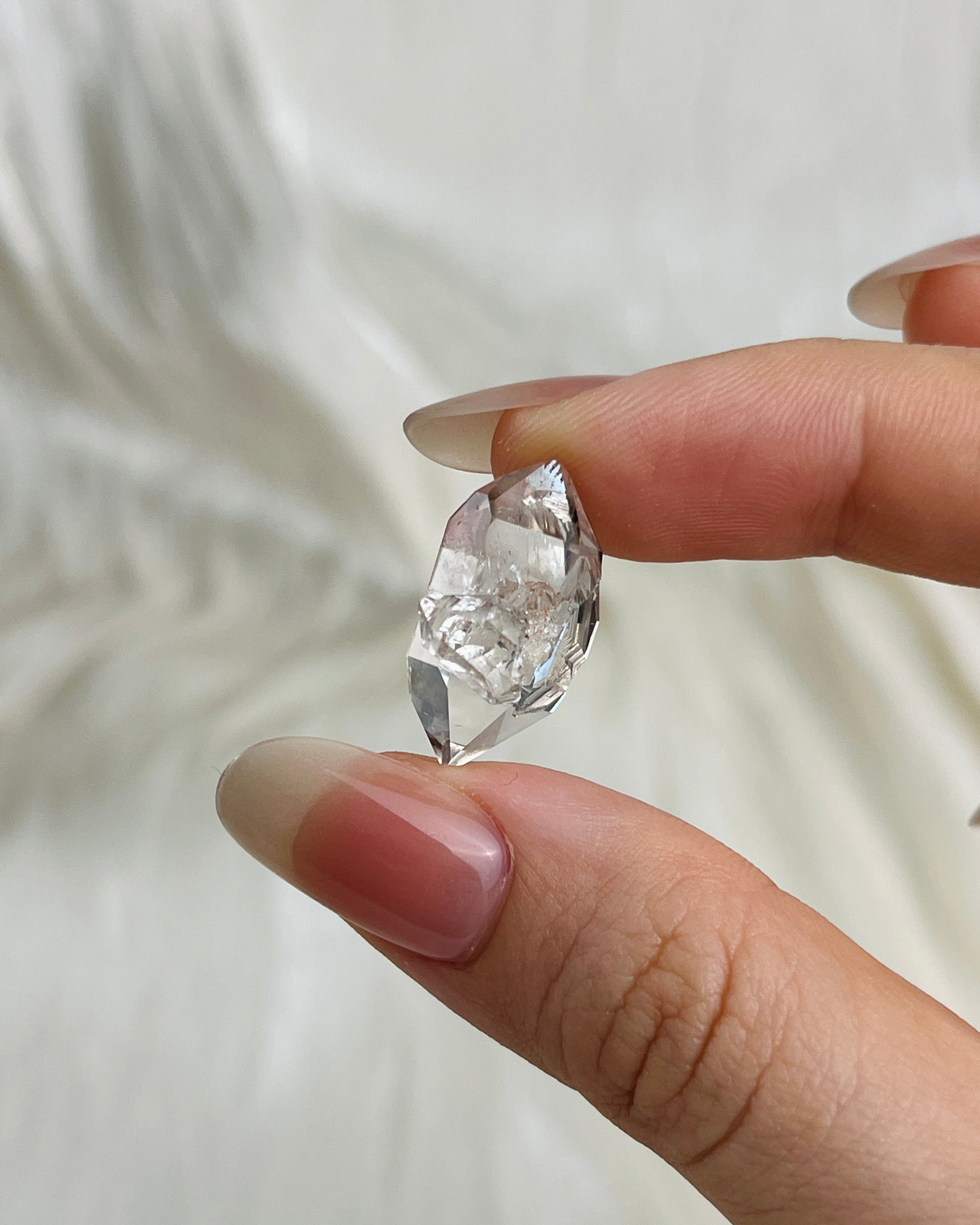 Bright Chongqing Diamond Quartz crystal with a flower-shaped surface mark and a light grey tip from China3