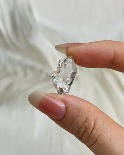 Bright Chongqing Diamond Quartz crystal with a flower-shaped surface mark and a light grey tip from China5