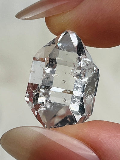 Water-clear Chongqing Diamond Quartz cluster with calcite inclusion and bright clarity from China