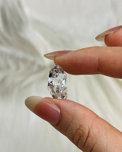 Water-clear Chongqing Diamond Quartz with rainbow reflections, calcite inclusion, and natural pit marks from China4