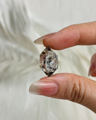 Transparent Chongqing Diamond Quartz cluster with calcite inclusion and internal rainbow reflections from China2