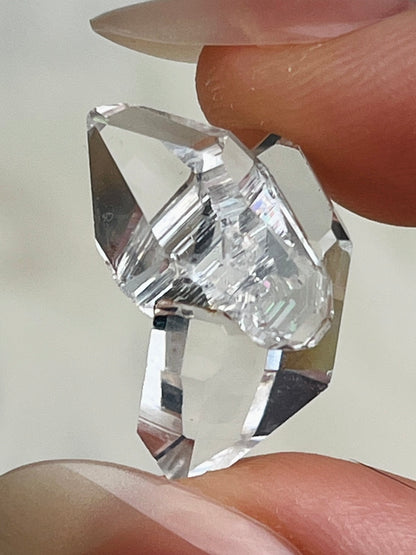 Water-clear Chongqing Diamond Quartz cluster with fingerprint rainbow inclusions and bright clarity from China