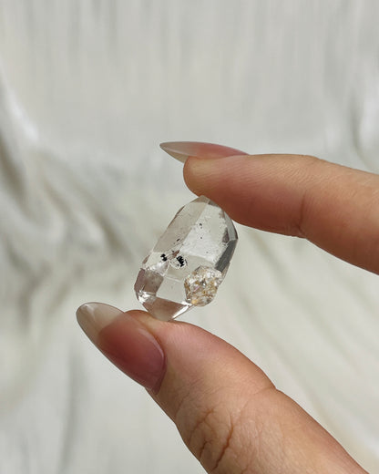 Water clear Chongqing Diamond Quartz with flowing sand inclusions and natural rider crystals from China1