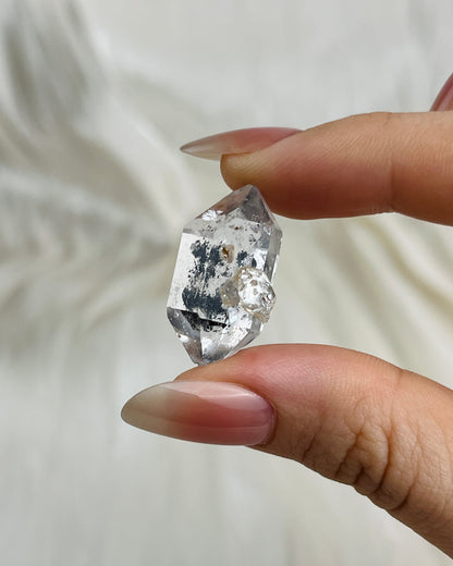 Transparent Chongqing Diamond Quartz with inky phantom inclusion aligned to outer edges and small rider crystal from China1