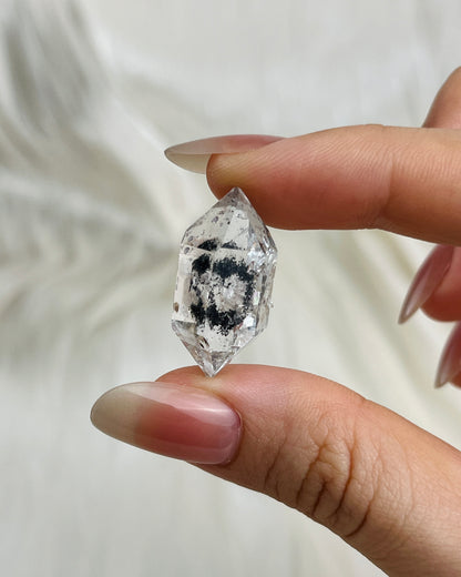 Transparent Chongqing Diamond Quartz with inky phantom inclusion aligned to outer edges and small rider crystal from China4