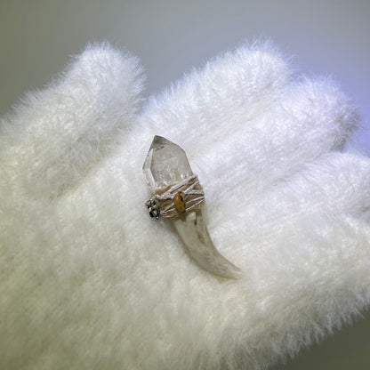 Ice Phantom Quartz Antler Pendant with rainbow inclusions, beige thread, and Picture Jasper accent on white glove