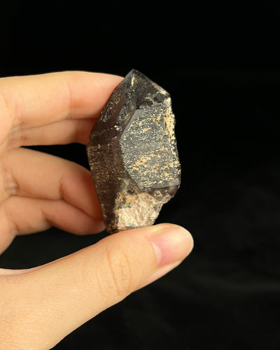Namibian amethyst with violet core and etched crocodile-textured surface, showing dark micro-inclusions.3