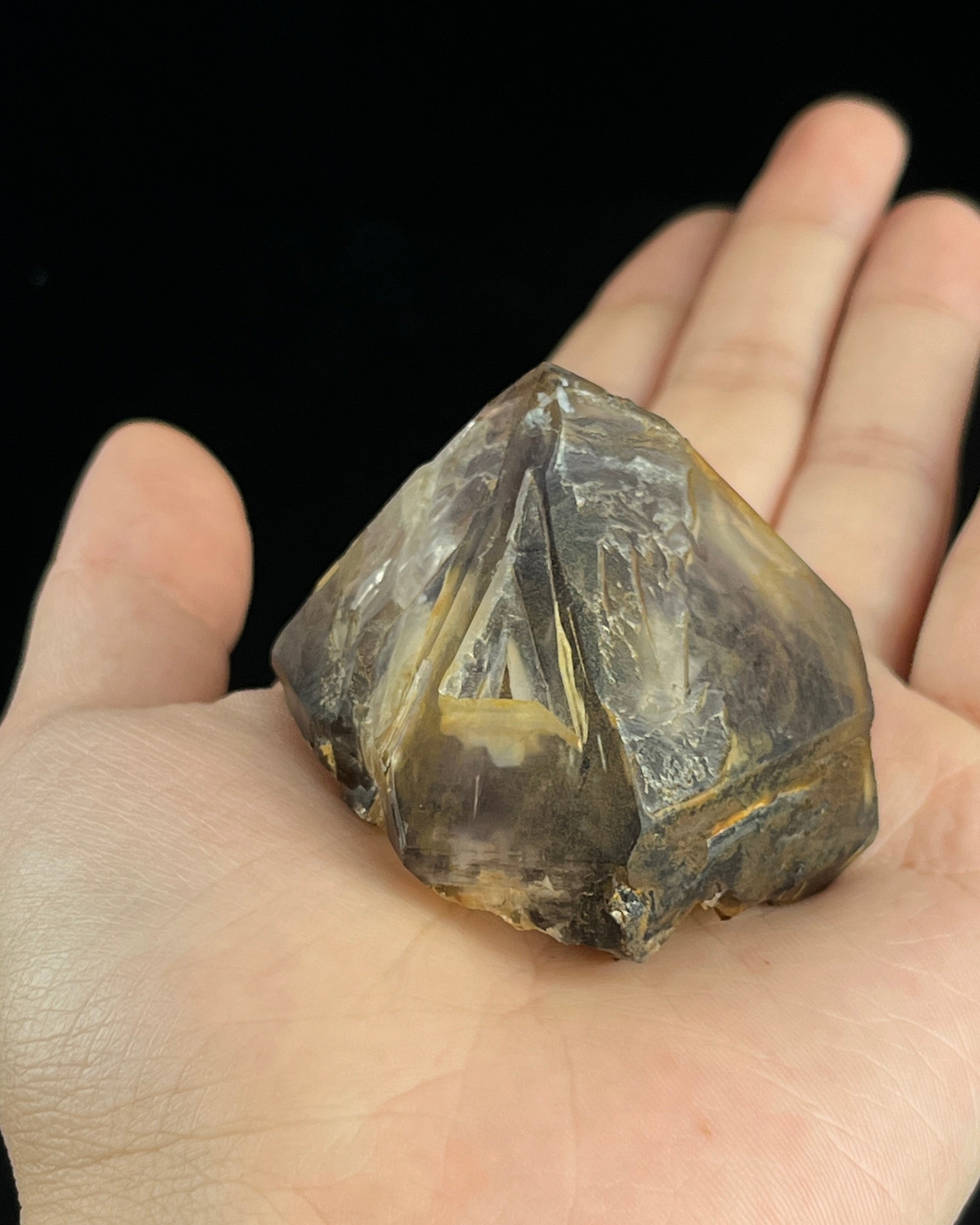 Natural Namibian skeletal amethyst specimen with etched “mountain” formations and smoky-violet zoning.1