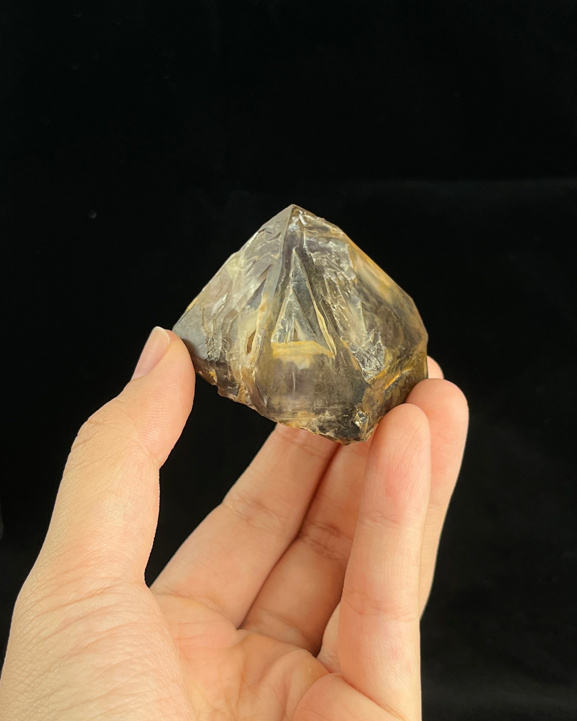 Natural Namibian skeletal amethyst specimen with etched “mountain” formations and smoky-violet zoning.2