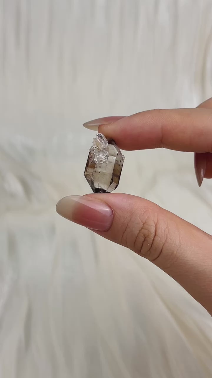 Load video: Champagne-colored Chongqing Diamond Quartz cluster with bright high-luster skin and clear double terminations from China video