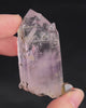 Soft lavender amethyst with self-healed regrowth crystals and a light chlorite coating near the base.video