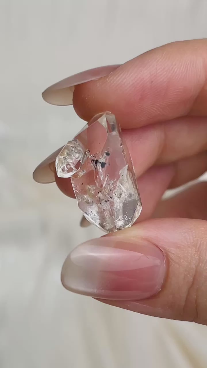Load video: Water clear Chongqing Diamond Quartz with flowing sand inclusions and natural rider crystals from China video
