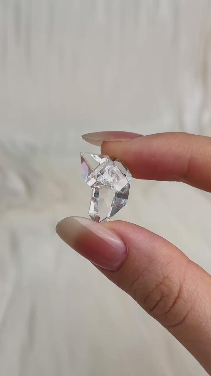 Load video: Water-clear Chongqing Diamond Quartz cluster with fingerprint rainbow inclusions and bright clarity from China video