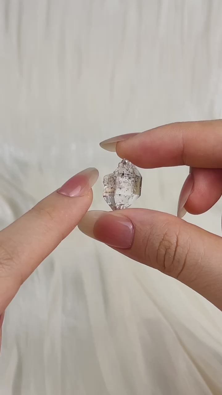 Bright Chongqing Diamond Quartz cluster with small calcite inclusion and balanced crystal formation from China video