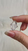 Bright Chongqing Diamond Quartz crystal with a flower-shaped surface mark and a light grey tip from China video