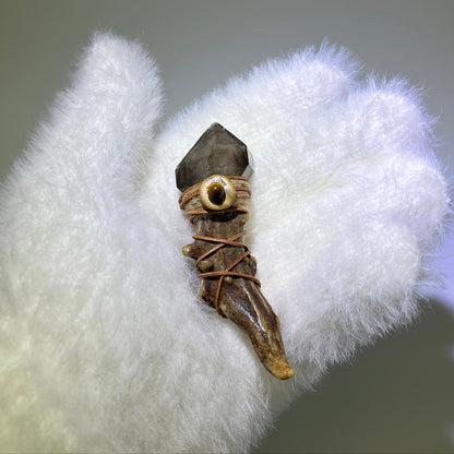 Smoky Quartz Antler Wand with Record Keeper crystal resting in a white glove