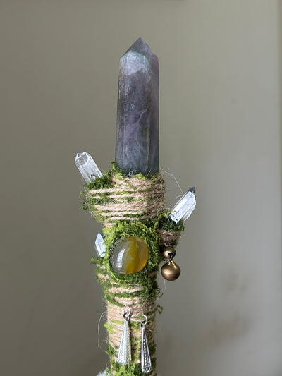 Close-up of green fluorite, kyanite, and moss-wrapped wand with silver butterfly