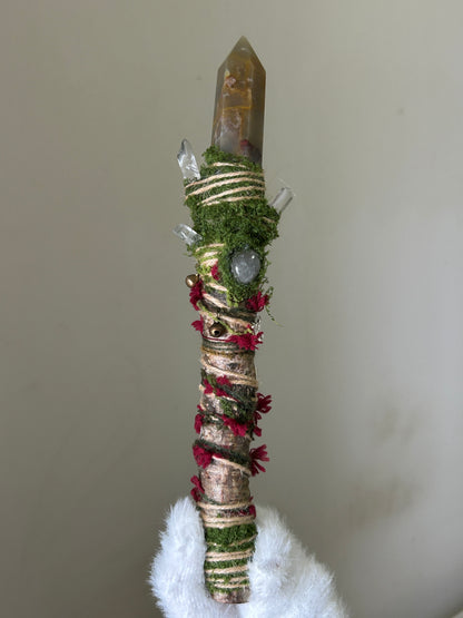 Front view of birch wand with red agate tip and green fluorite accent