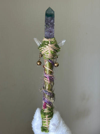 Back view of willow wand with clear quartz and wrapped charms