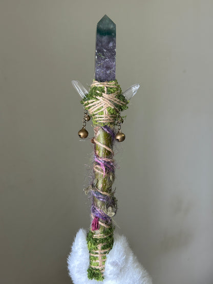 Back view of willow wand with clear quartz and wrapped charms