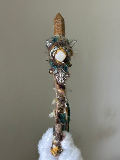 Front view of willow wand with picture jasper point and yellow calcite accent