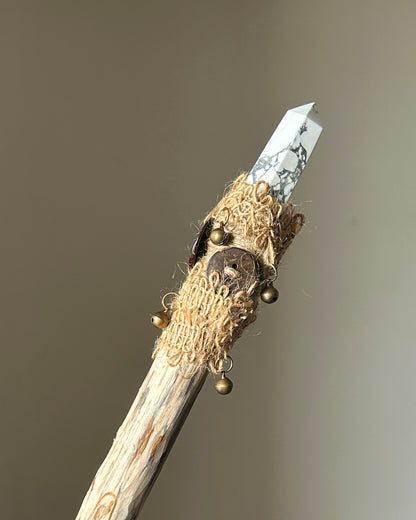 Front view of white birch wand with polished howlite point, hemp wrapping, and coconut charm
