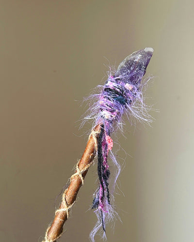 Back view of amethyst wand with spiral threads and dreamy textured yarn