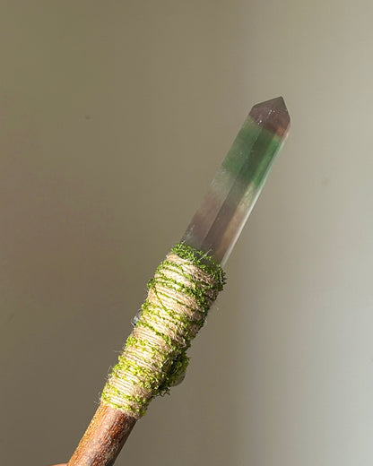 Back view of forest wand with clear quartz accents and earthy wrapping style